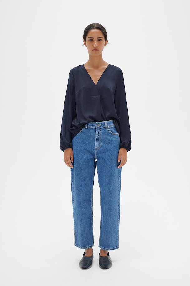 Black blouse and blue jeans outlet